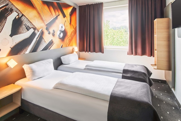 Allergikerbettwaren, Schreibtisch, schallisolierte Zimmer