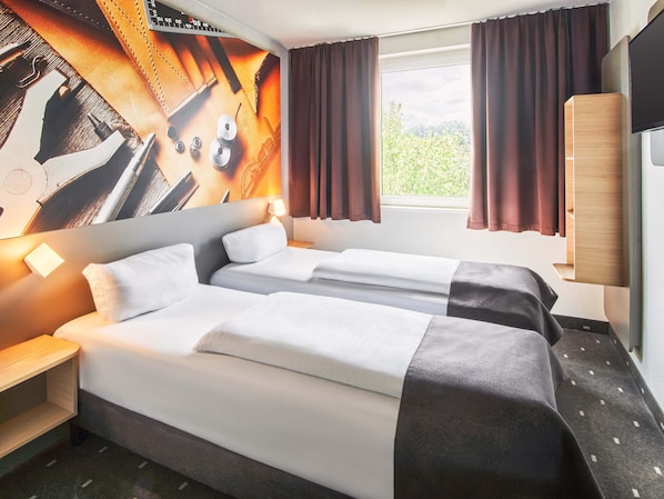 Roupas de cama antialérgicas, escrivaninha, quartos à prova de som