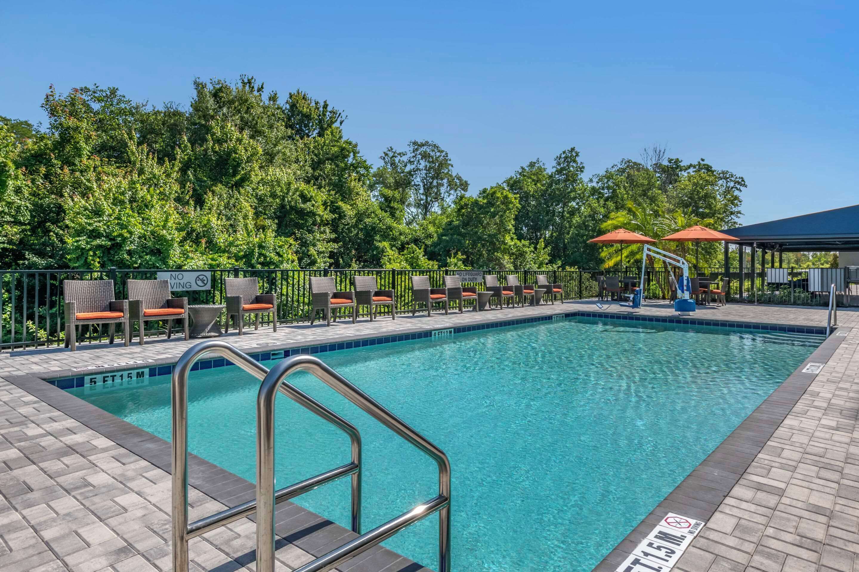 outdoor pool, pool umbrellas, pool loungers