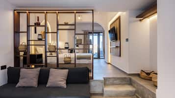Signature Suite, 1 Queen Bed with Sofa bed, Hot Tub, Sea View | Living area | 42-inch Smart TV with satellite channels, TV, Netflix