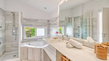Bathtub, hair dryer, towels