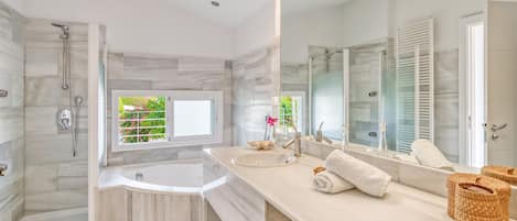 Bathtub, hair dryer, towels