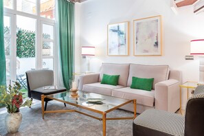 Apartment (2 Bedrooms) | Living area | 32-inch flat-screen TV with cable channels, TV