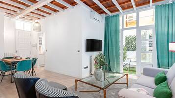 Apartment (2 Bedrooms) | Living area | 32-inch flat-screen TV with cable channels, TV