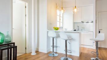 Departamento, Terraza (2 Bedrooms) | Cocina privada | Refrigerador, microondas, horno y parrilla de estufa