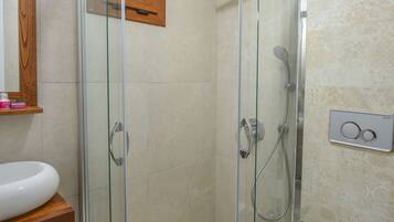 Shower, hydromassage showerhead, towels, soap