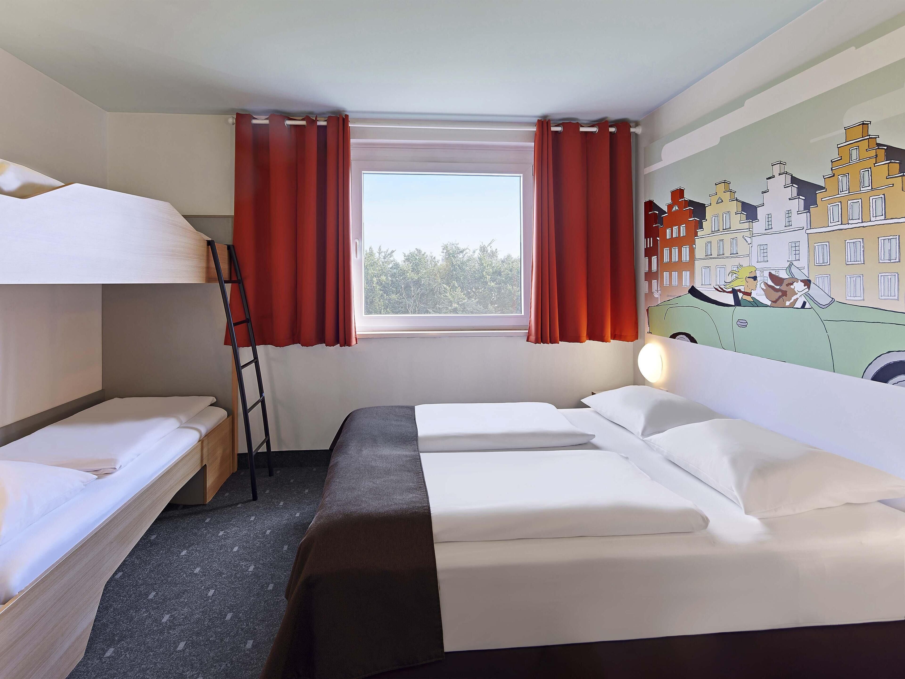 Escritorio, sistema de insonorización, wifi gratis y ropa de cama 