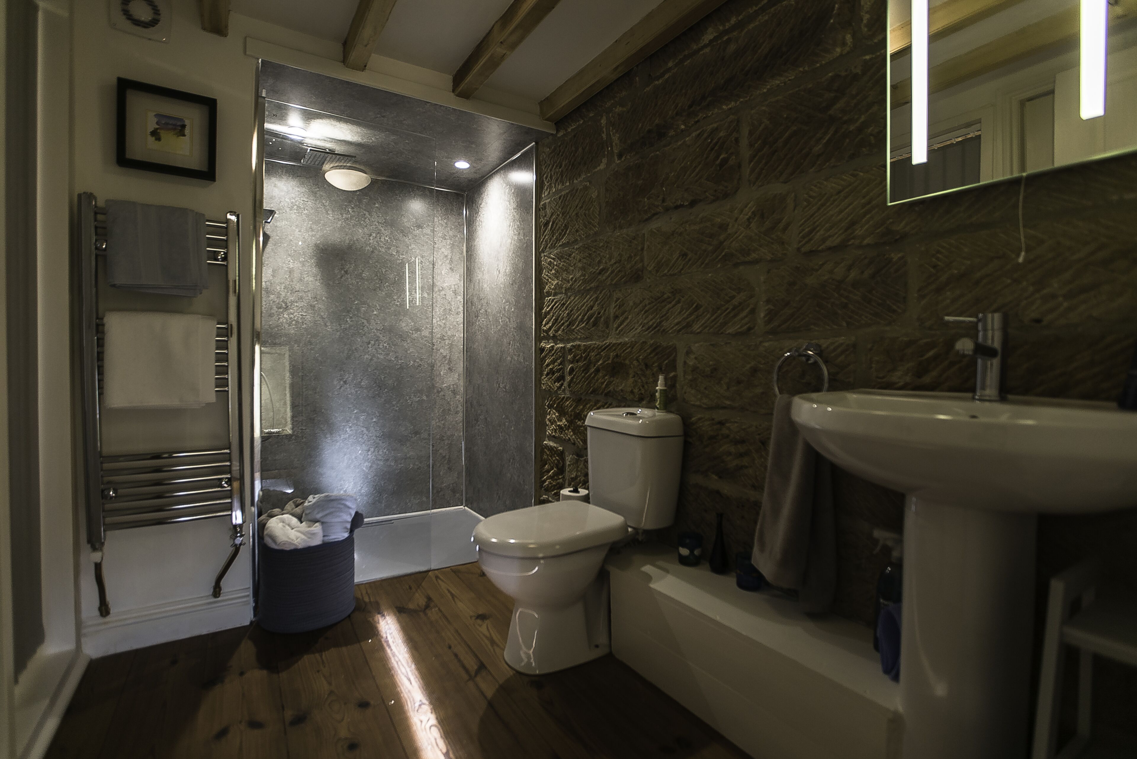 Combined shower/bathtub, hair dryer, towels, toilet paper