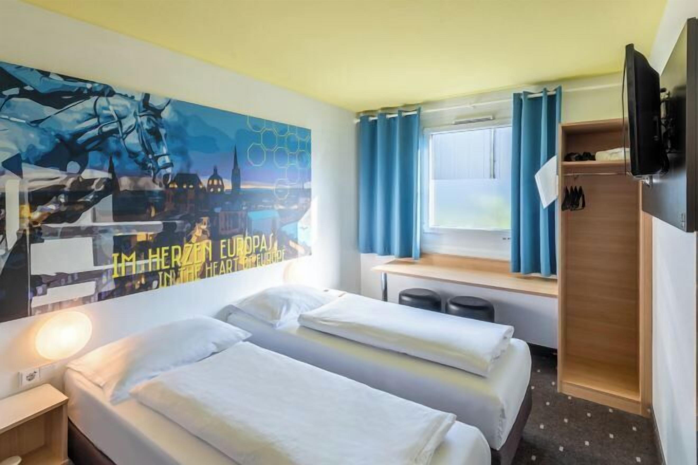 Ropa de cama hipoalergénica, escritorio, insonorización y wifi gratis 