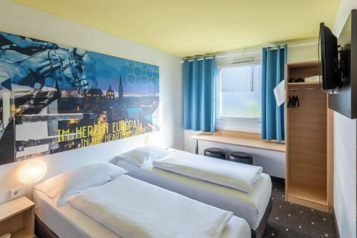 Ropa de cama hipoalergénica, escritorio, insonorización y wifi gratis