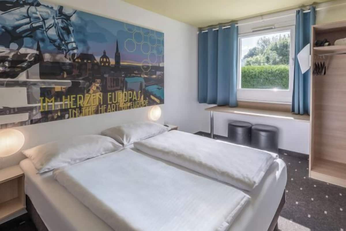 Ropa de cama hipoalergénica, escritorio, insonorización y wifi gratis