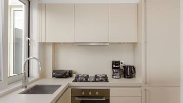 Luxury Villa, 4 Bedrooms, Sea View, Beachfront | Private kitchen | Full-size fridge, microwave, oven, stovetop
