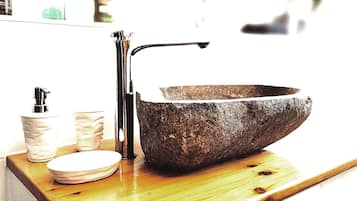 Bathtub, hair dryer, towels, soap