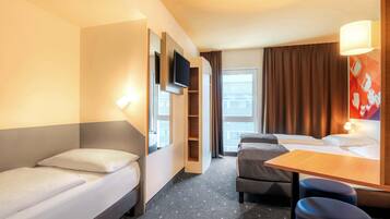 Ropa de cama hipoalergénica, escritorio y sistema de insonorización