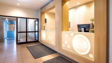 Shower, hair dryer, soap, shampoo