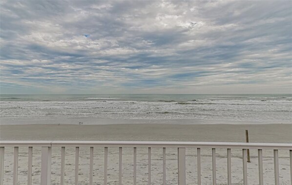 On the beach, sun-loungers