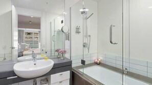 Shower, hair dryer, towels