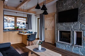 Flat-screen TV, fireplace, heated floors