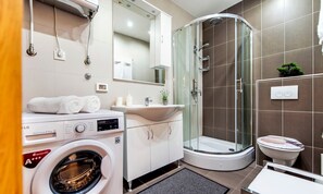 Shower, free toiletries, hair dryer, towels