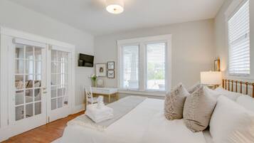 4 bedrooms, desk, iron/ironing board, travel cot
