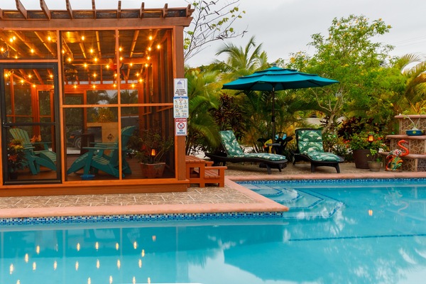Sit at dusk with friends in the screened gazebo and bar. No bugs