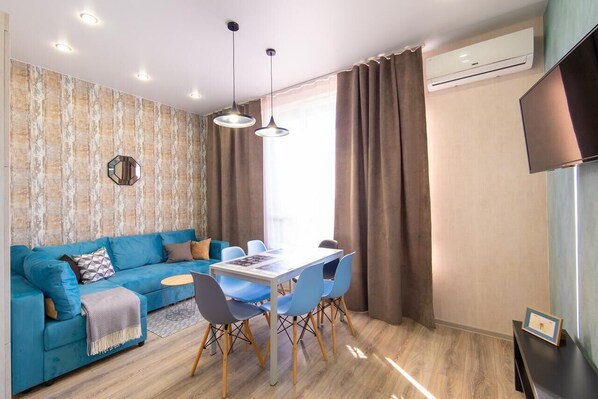 Business-Apartment | Wohnbereich | Flachbildfernseher