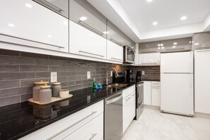Full-sized fridge, microwave, oven, dishwasher
