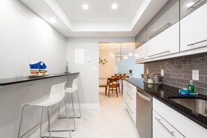 Full-sized fridge, microwave, oven, dishwasher