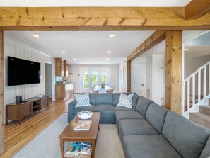 Smart TV, DVD player, foosball, books