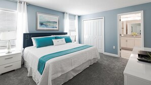 A bedroom with a bed, a nightstand, a dresser, a door, and a window with blinds. - 4815ds-non Renting February 1, 2023 Storey Lake (Kissimmee)