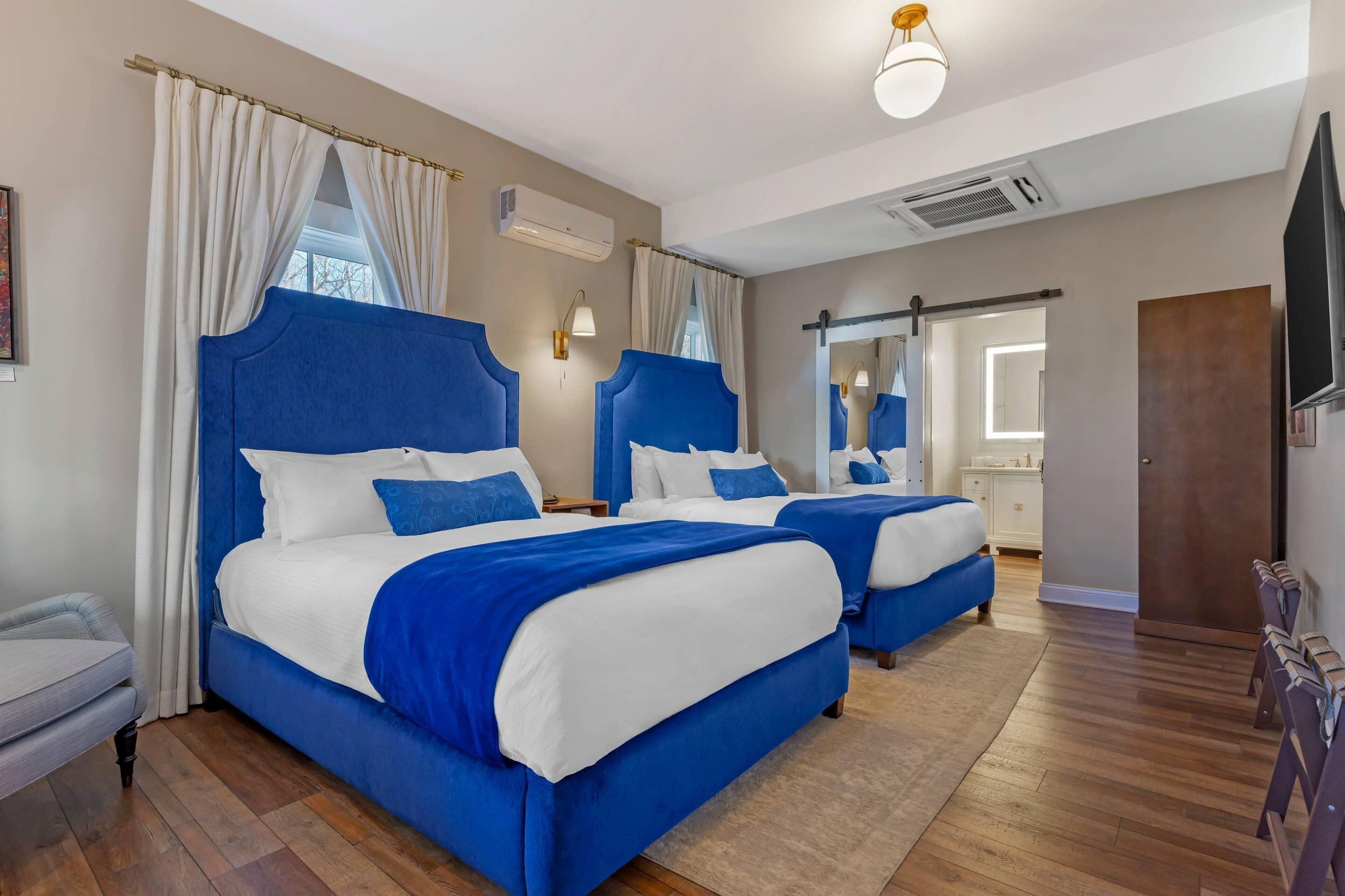 Standard Room, 2 Queen Beds, Non Smoking | Premium bedding, down comforters, blackout drapes, iron/ironing board