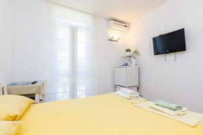 1 quarto, acesso à internet, roupa de cama