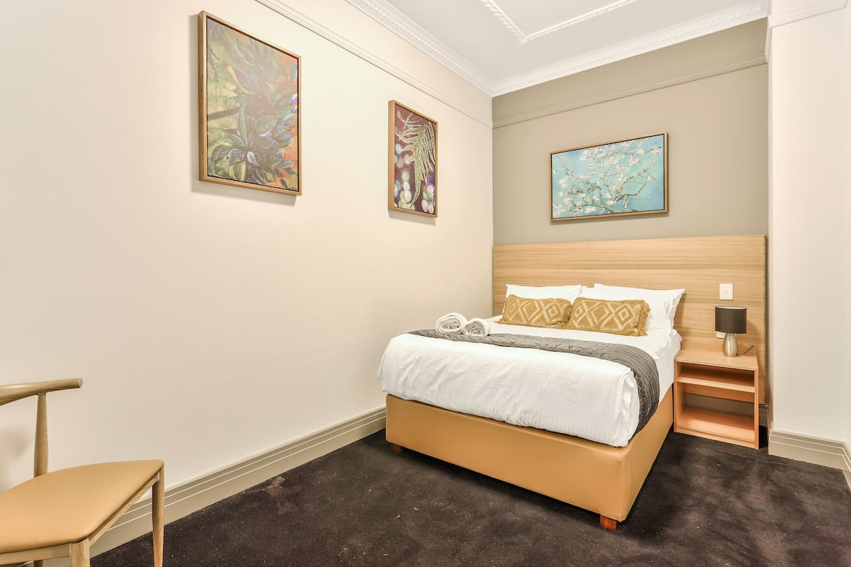 Deluxe Quadruple Room, 2 Queen Beds, Non Smoking | In-room safe, desk, free WiFi, bed sheets
