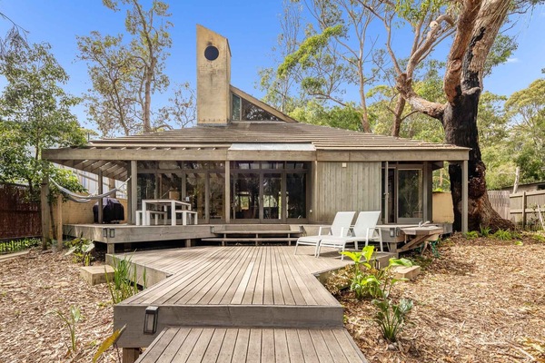 Rear view of the house and garden looking back from the jetty
