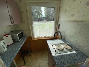 Fridge, microwave, high chair
