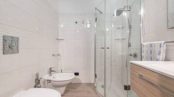 Shower, free toiletries, hair dryer, towels