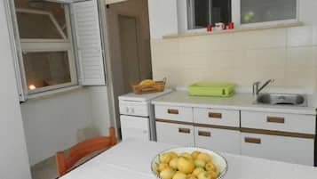 Apartment (One-Bedroom Apartment with Terrace-1 ) | Private kitchen | Fridge