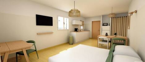 A hotel room with a bed, a desk, a chair, a television, a kitchen area, and a window.