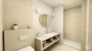 A modern bathroom with a marble wall, a round mirror, a white sink, and a potted plant.
