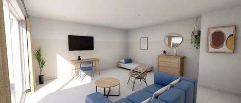 Un salon moderne avec un canapé bleu, un bureau en bois, une chaise, une petite table ronde et un lit avec un coussin bleu.