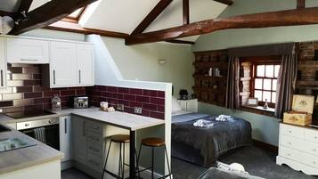 1 bedroom, desk, iron/ironing board, travel cot