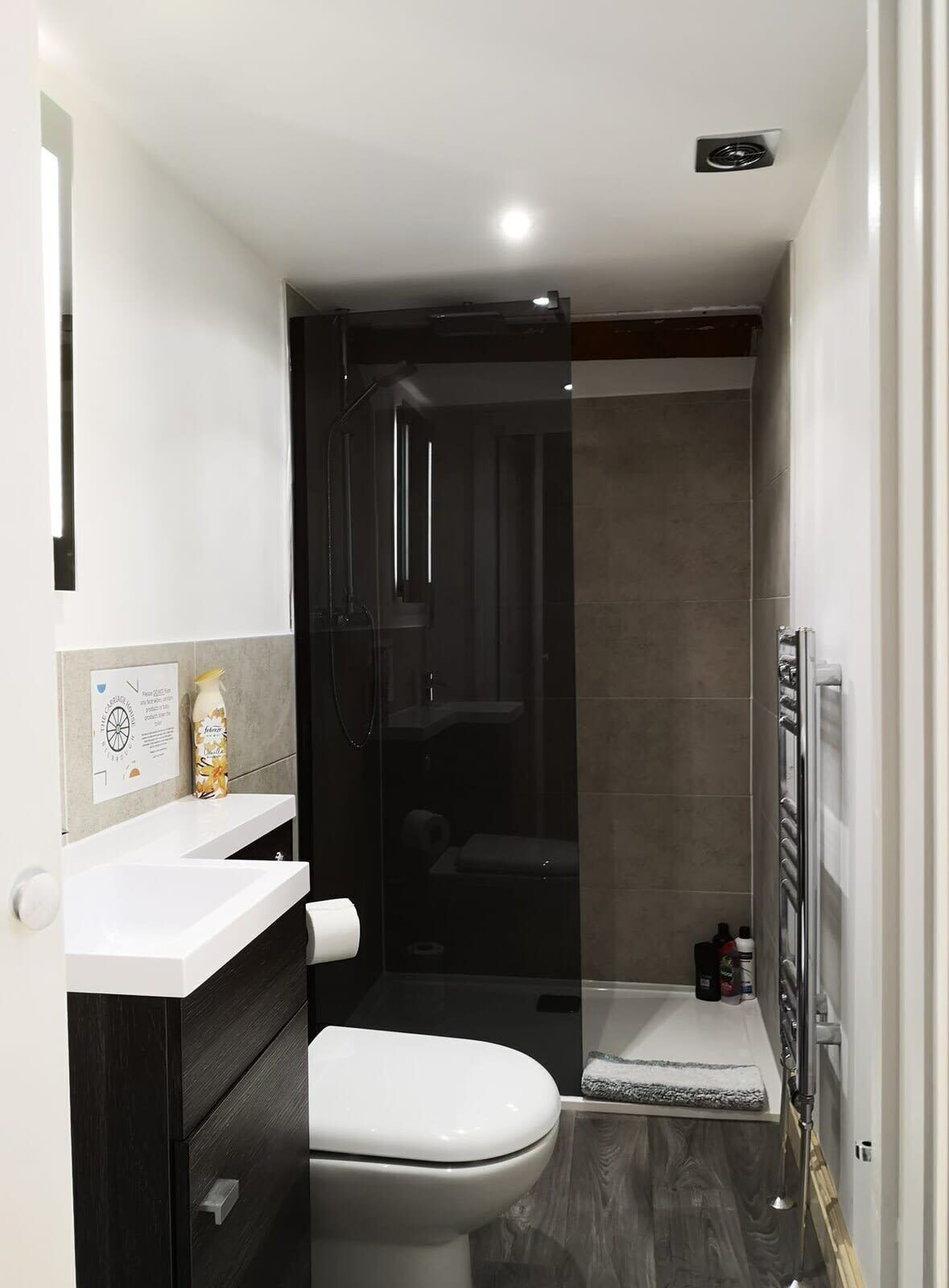 Bathtub, hair dryer, towels