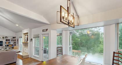 Riverfront retreat w/ wraparound deck, gas grill, free WiFi, & central AC