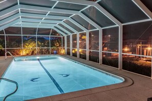 Outdoor pool, a heated pool - Luxurious Waterfront Retreat! Oversized Heated Pool and expansive outdoor area! (Naples)