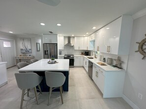 Fridge, microwave, oven, stovetop - Luxurious Waterfront Retreat! Oversized Heated Pool and expansive outdoor area! (Naples)