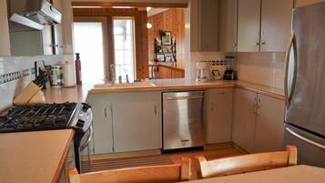 House, Multiple Beds (1303 N Prom) | Private kitchen | Spices, paper towels