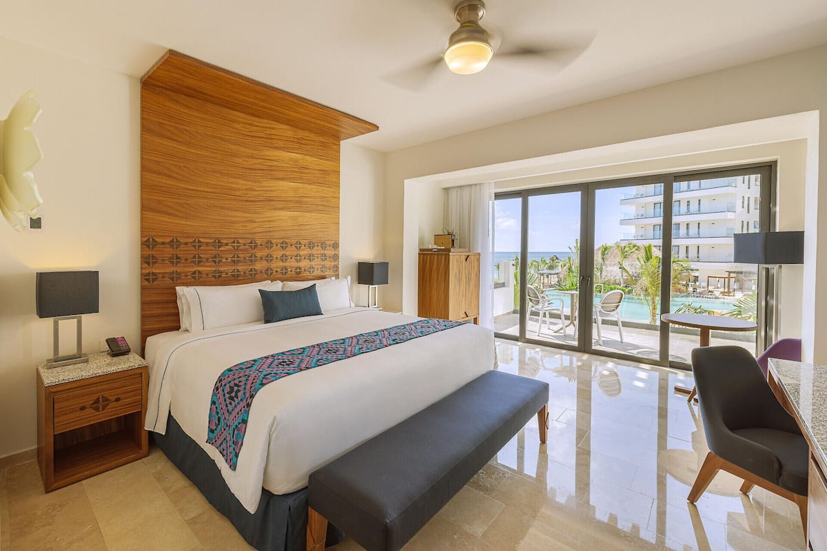 Premium bedding, pillowtop beds, minibar (free items), in-room safe
