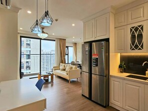 Business Apartment, 2 Bedrooms | Living area | 47-inch flat-screen TV with cable channels, TV - Vinhomes Ocean Park Gia Lam Apartment (Hanoi)