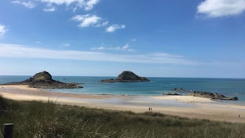 Beach nearby, sun loungers