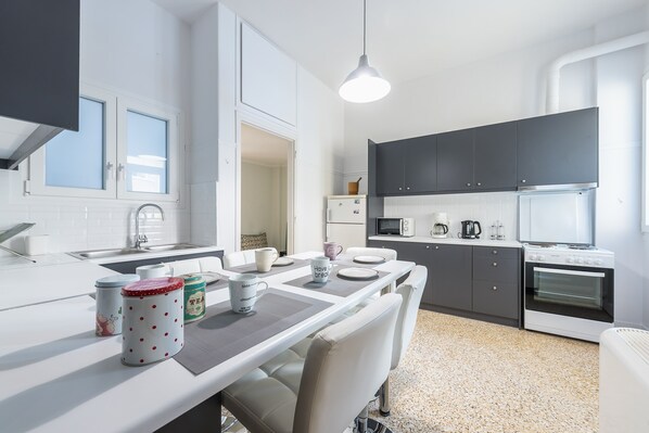 Mini-fridge, oven, stovetop, espresso maker